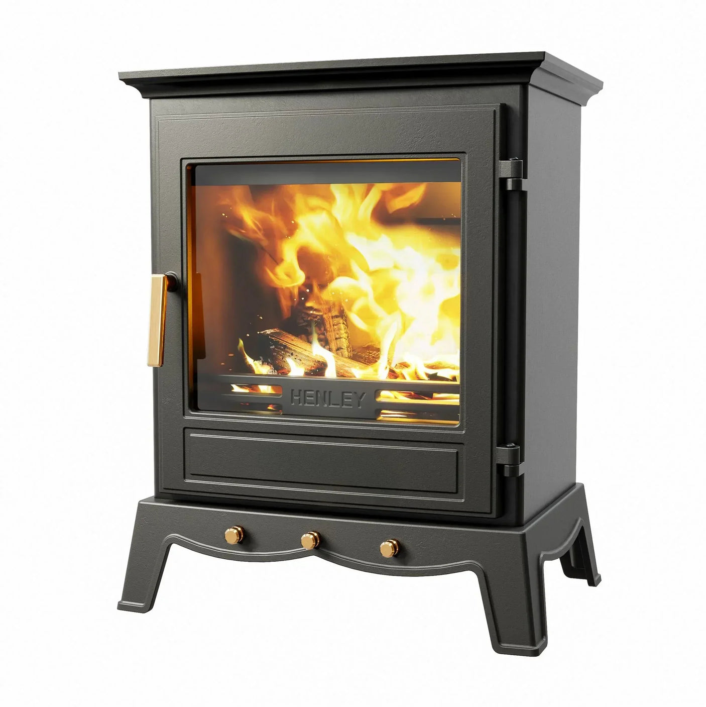 Black wood burning stove with glass door and brass handle showing fire inside