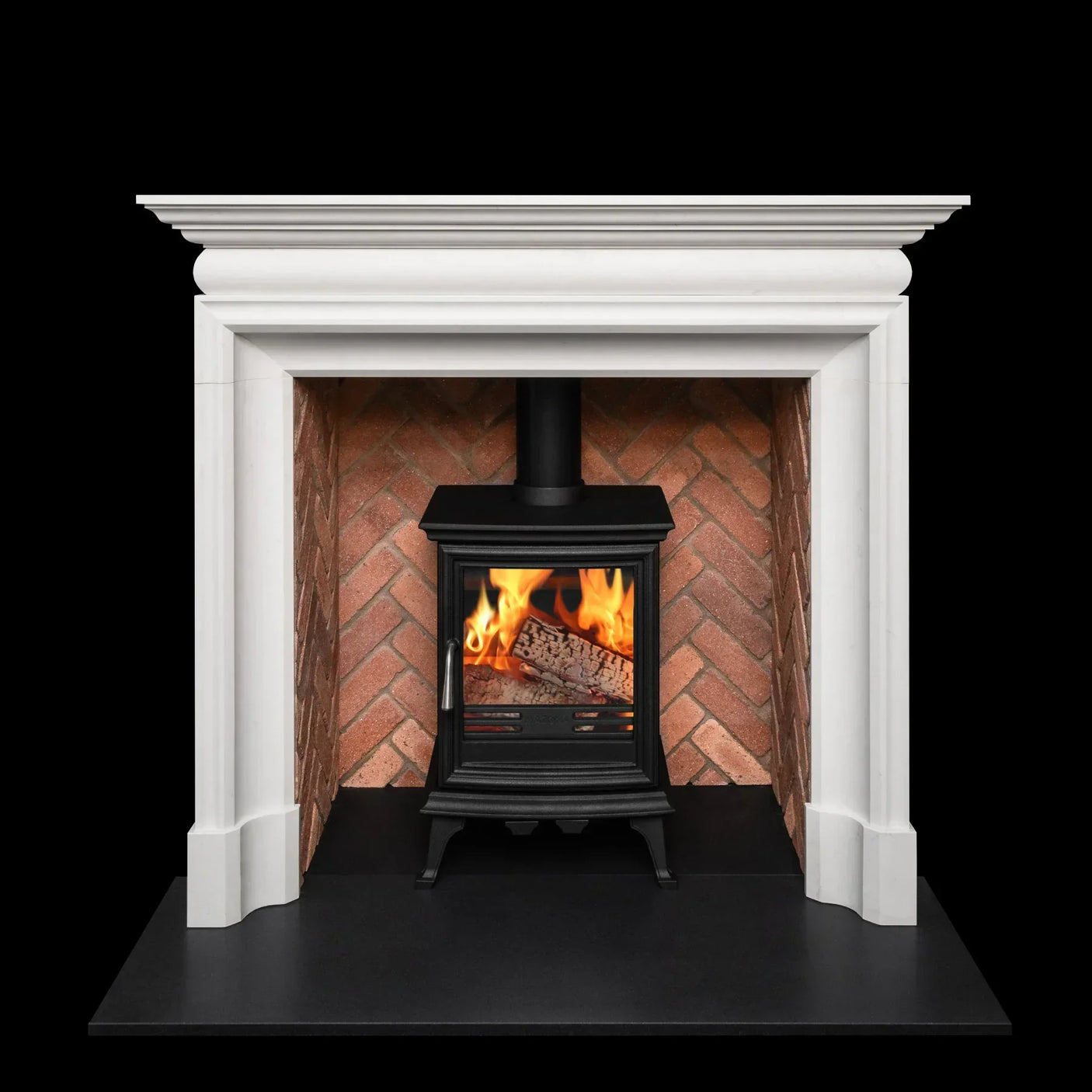 White fireplace surround with brick interior and black wood burning stove heater