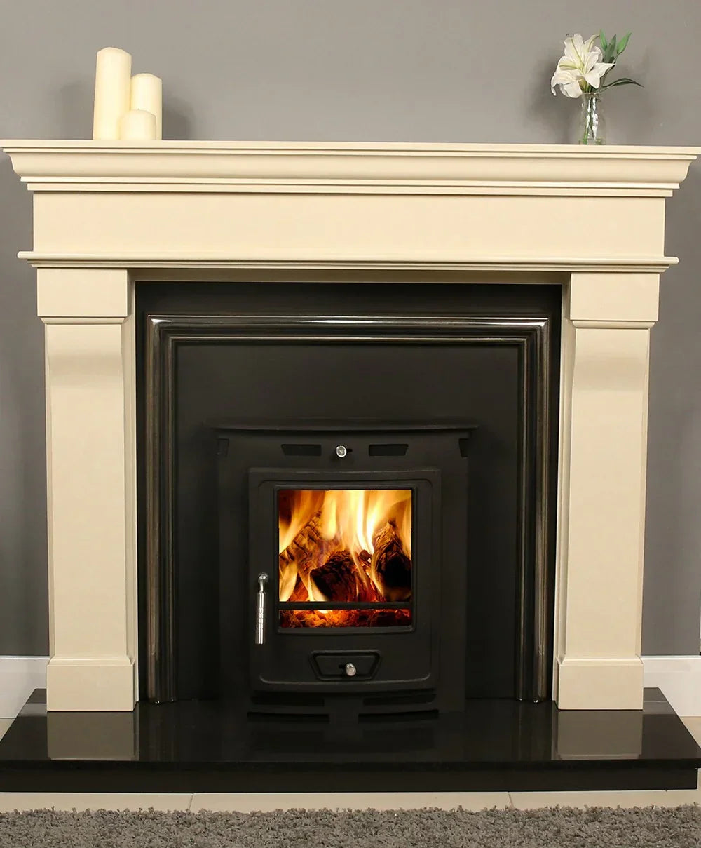 Cream fireplace surround with crete wood burning stove and black hearth, modern living room