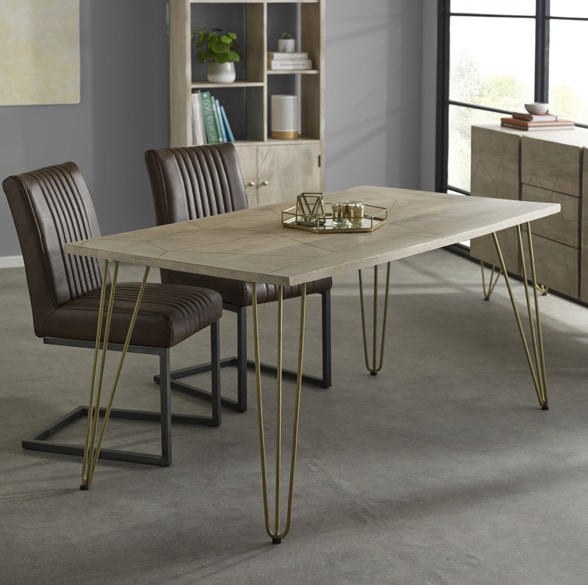 Modern light gold dining table with metal inlays and solid mango wood