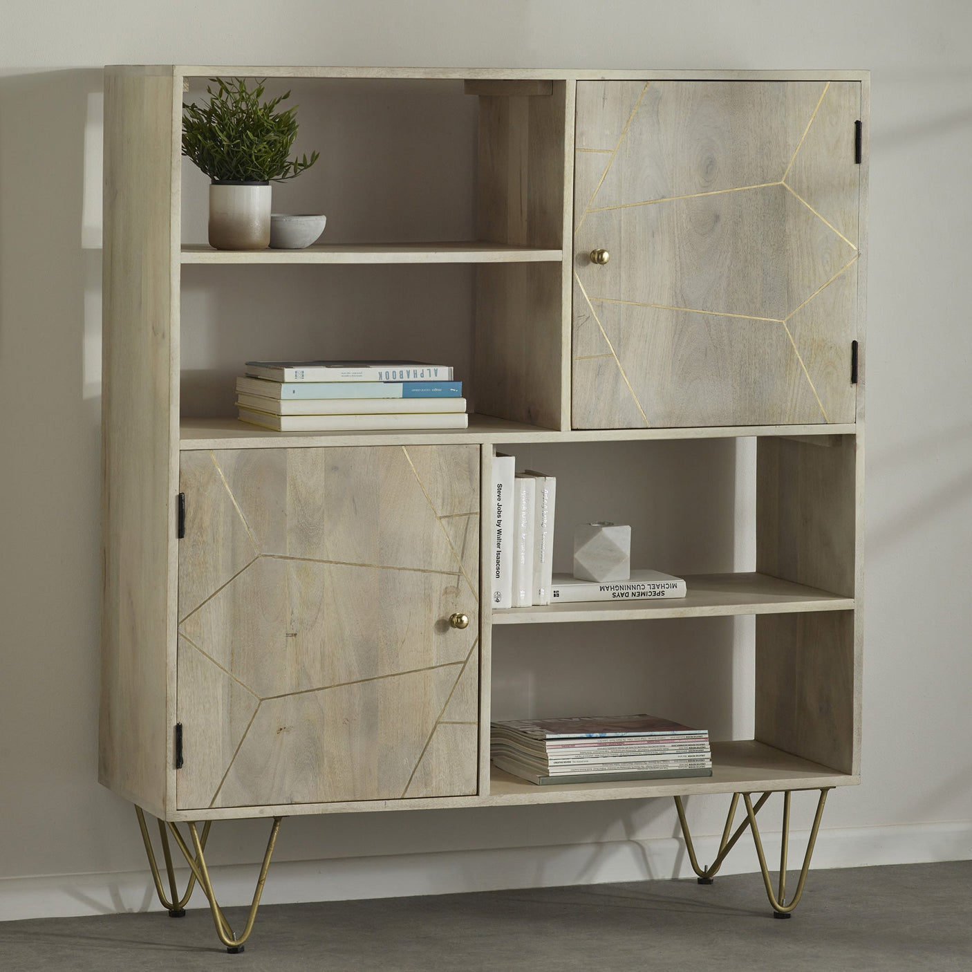 Light gold display cabinet made of solid mango wood with metal inlays