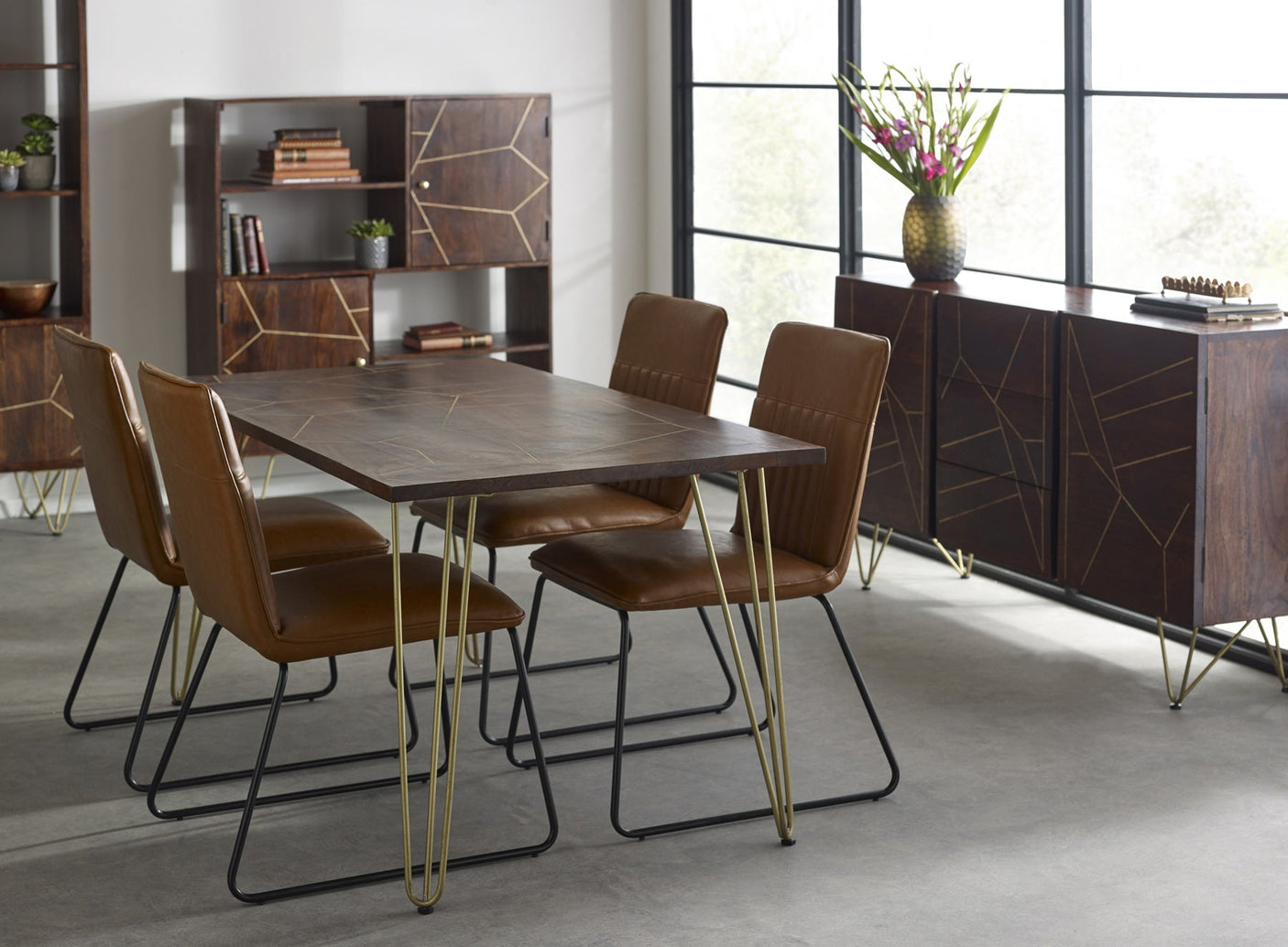 Dark gold dining table made of solid mango wood with metal inlays