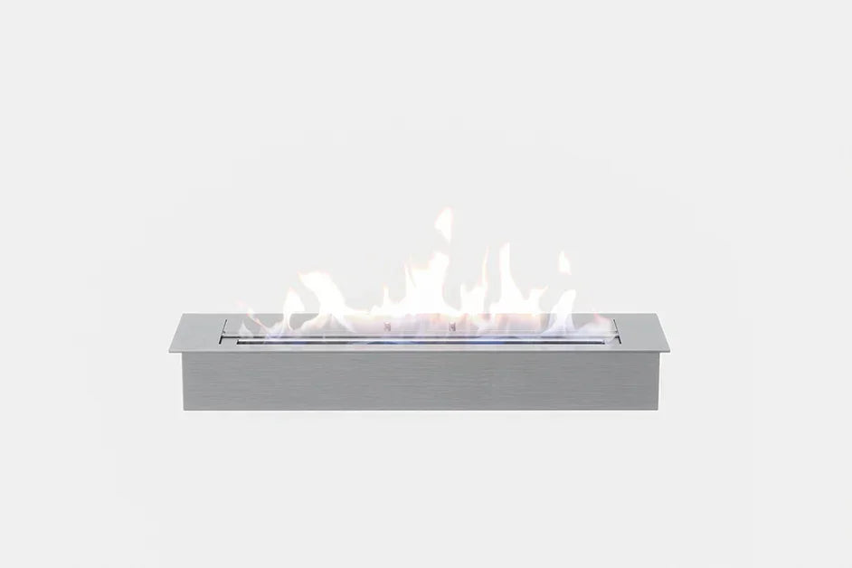 Rectangular stainless steel bioethanol burner with visible flame on white background