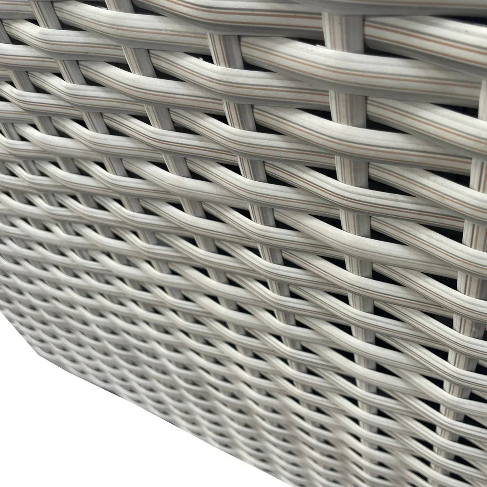 Grey rattan garden furniture closeup showing woven outdoor material texture