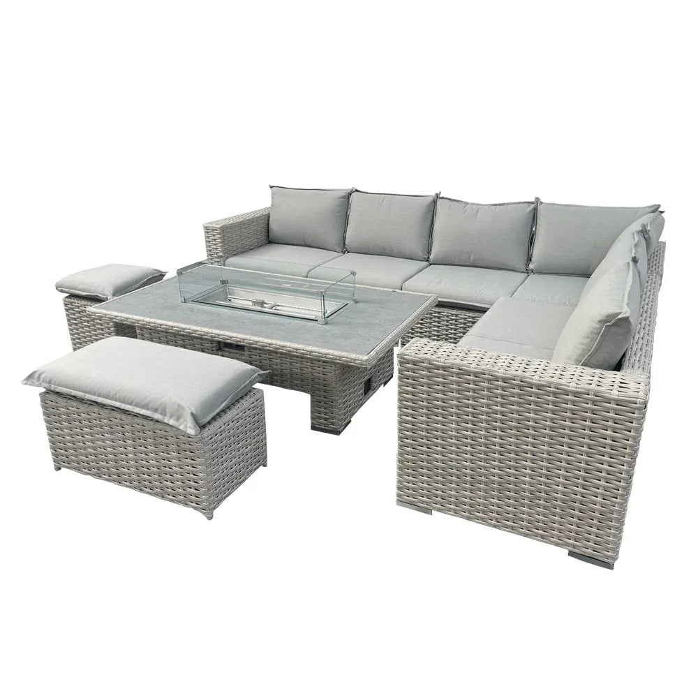 Grey rattan garden corner sofa set with cushions, fire pit table, and matching stools