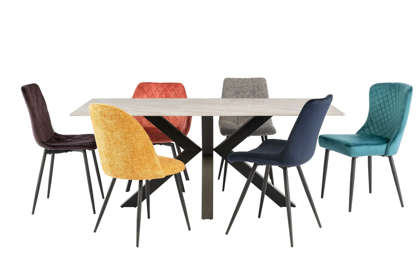 Modern dining table with black metal legs and six colorful fabric dining chairs