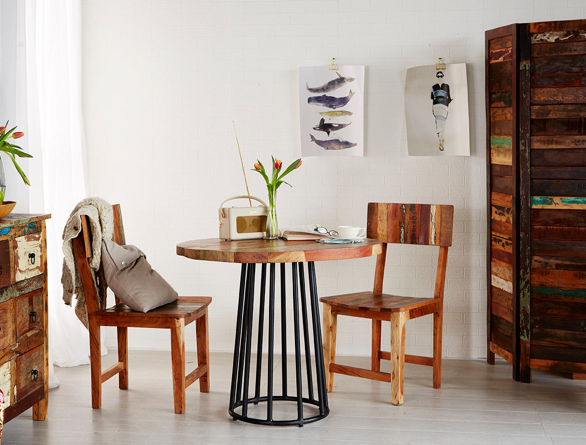 Coastal round dining table made from reclaimed wood, fully assembled