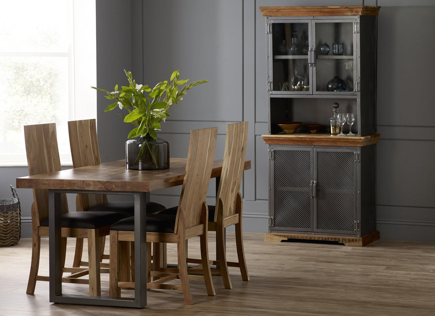Metropolis Industrial Dining Table made from solid acacia wood with a distressed finish.