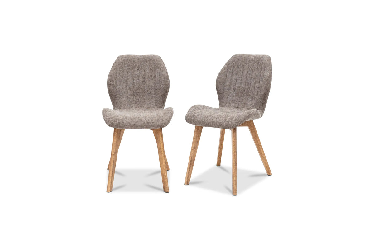 Two modern dining chairs with textured taupe bouclé seats and backs and light natural wood legs, shown on a plain white background.
