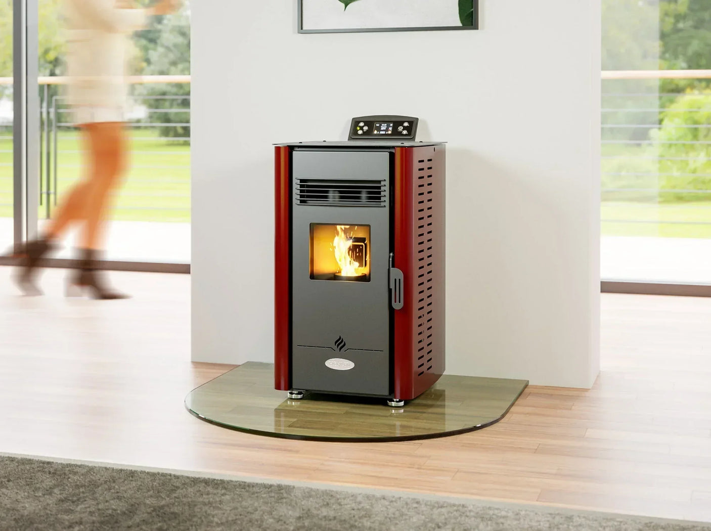 Red and black freestanding pellet stove with glass front in modern living room setting