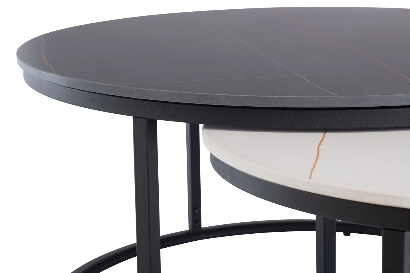 Close-up of black and white marble nesting coffee tables with metal frame
