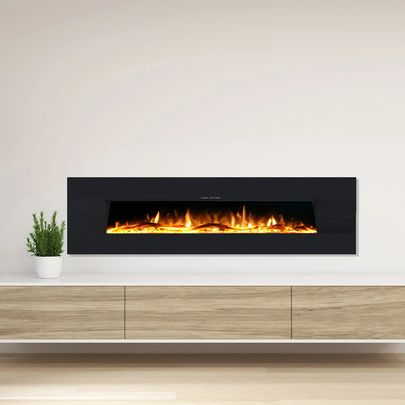 Wall mounted electric fireplace with orange flame above modern wooden TV unit