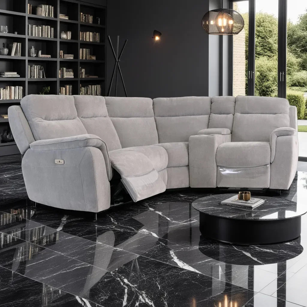Silver grey fabric corner sofa with recliner in modern living room with black marble floor