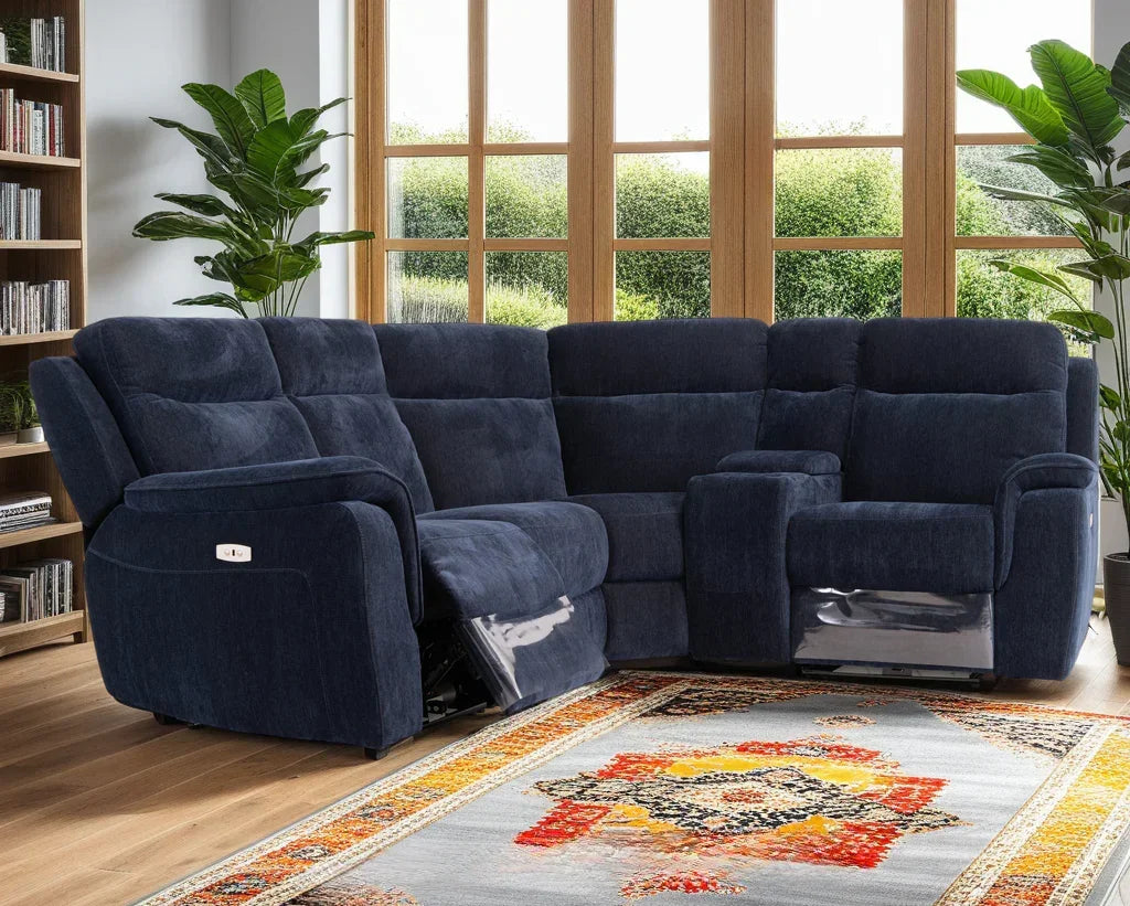 Blue fabric corner sofa with recliner seats in modern living room with large windows