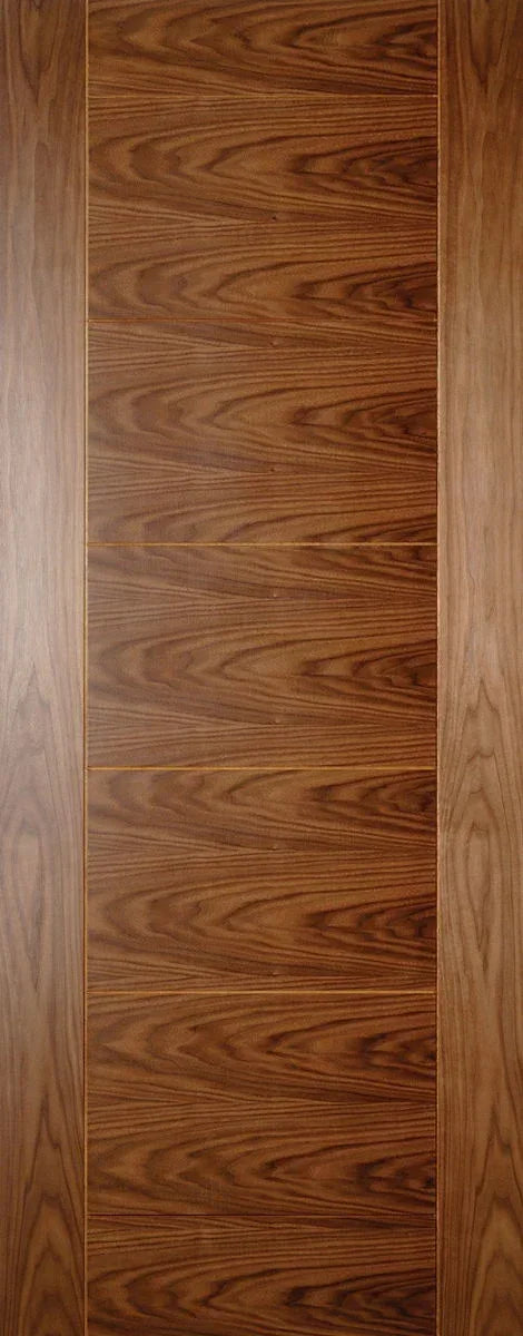 walnut wood interior door panel with vertical grain and natural finish