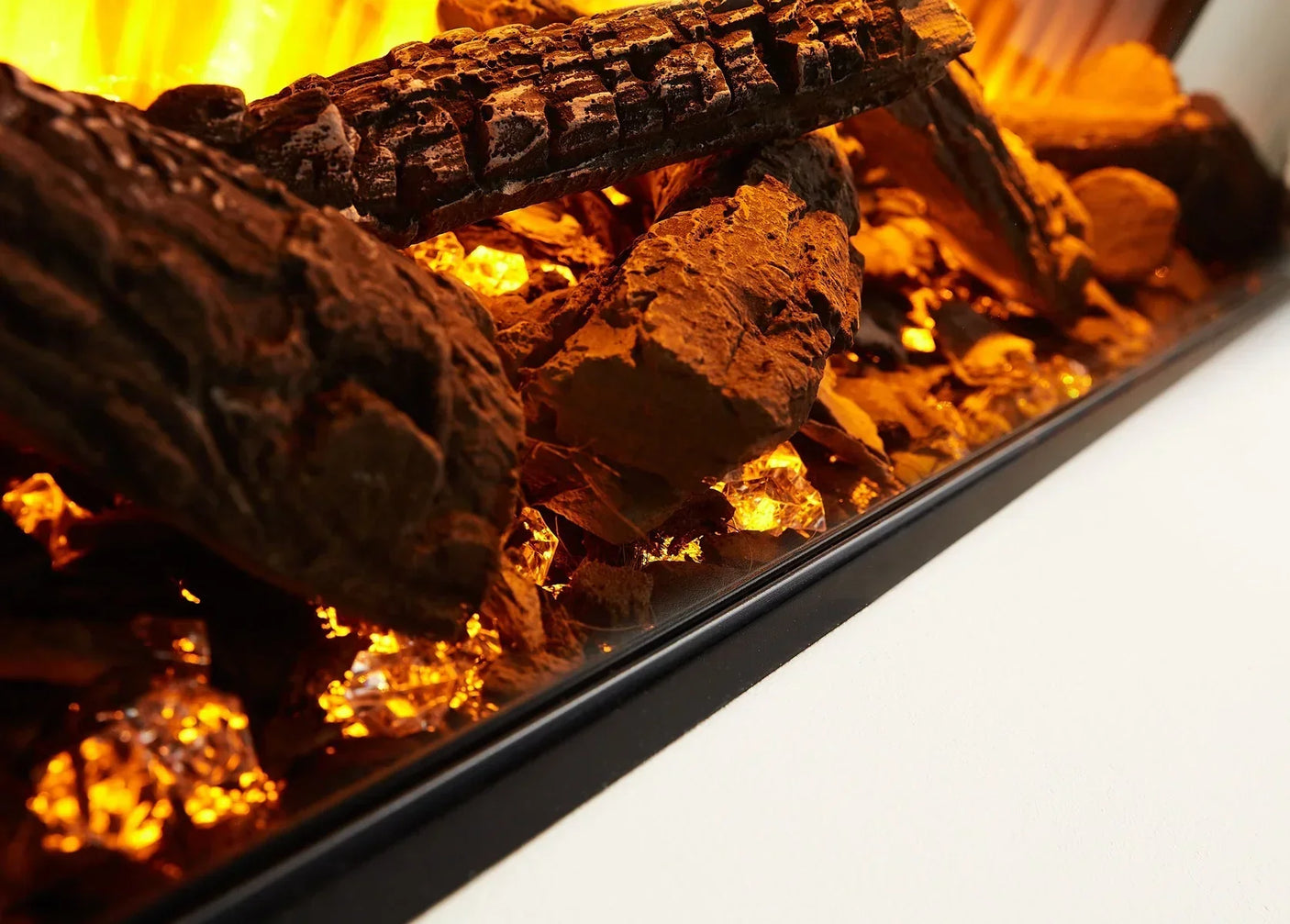 Electric fire with realistic glowing logs and crystal embers in modern black frame