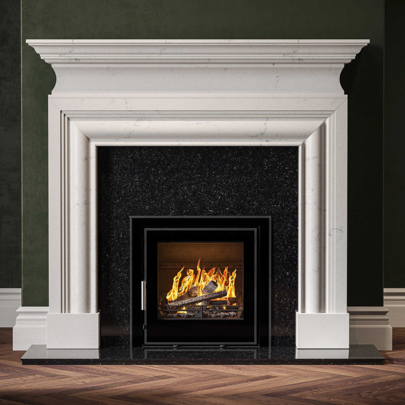 Modern marble fireplace with black granite surround and inset gas fire on herringbone floor