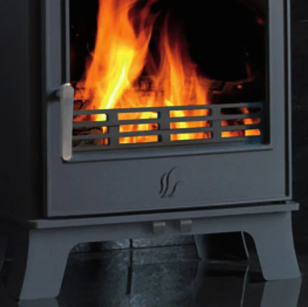 black wood burning stove with visible fire and metal handle on front panel