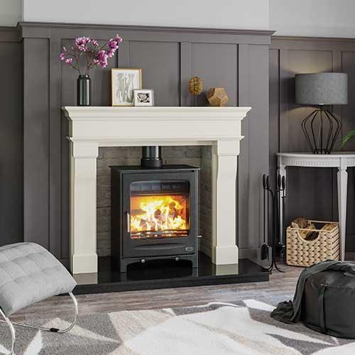 Modern fireplace suite with wood burner stove in stylish living room setting