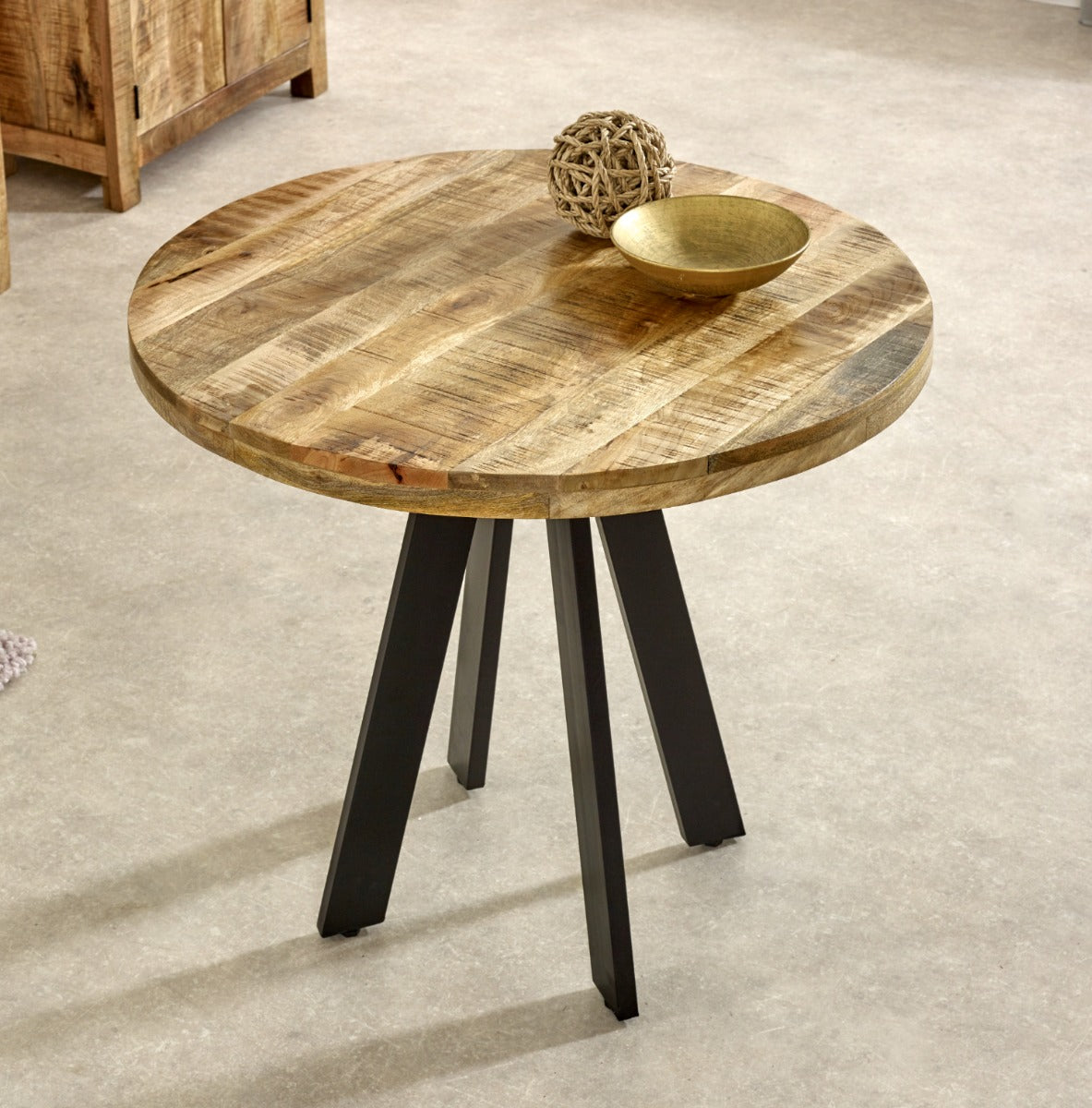 Surrey Round Dining Table made of mango wood with metal legs