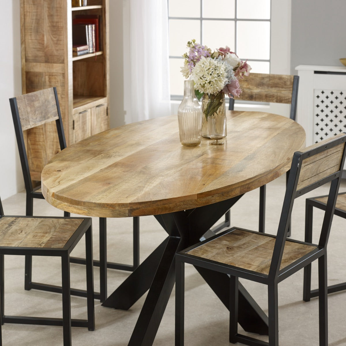 Surrey solid wood oval dining table with metal legs, rustic style