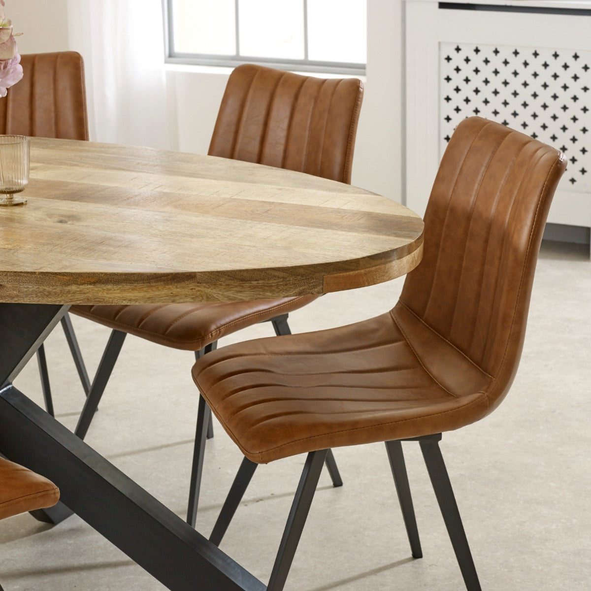 Surrey solid wood oval dining table with metal legs, rustic style