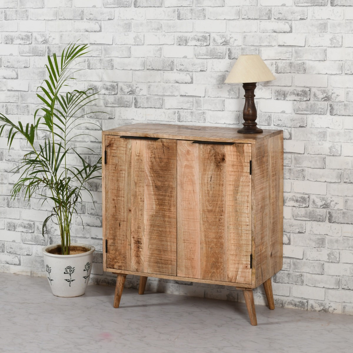 Surrey solid wood drinks cabinet with a lacquered finish, showcasing handmade craftsmanship and natural wood grain.