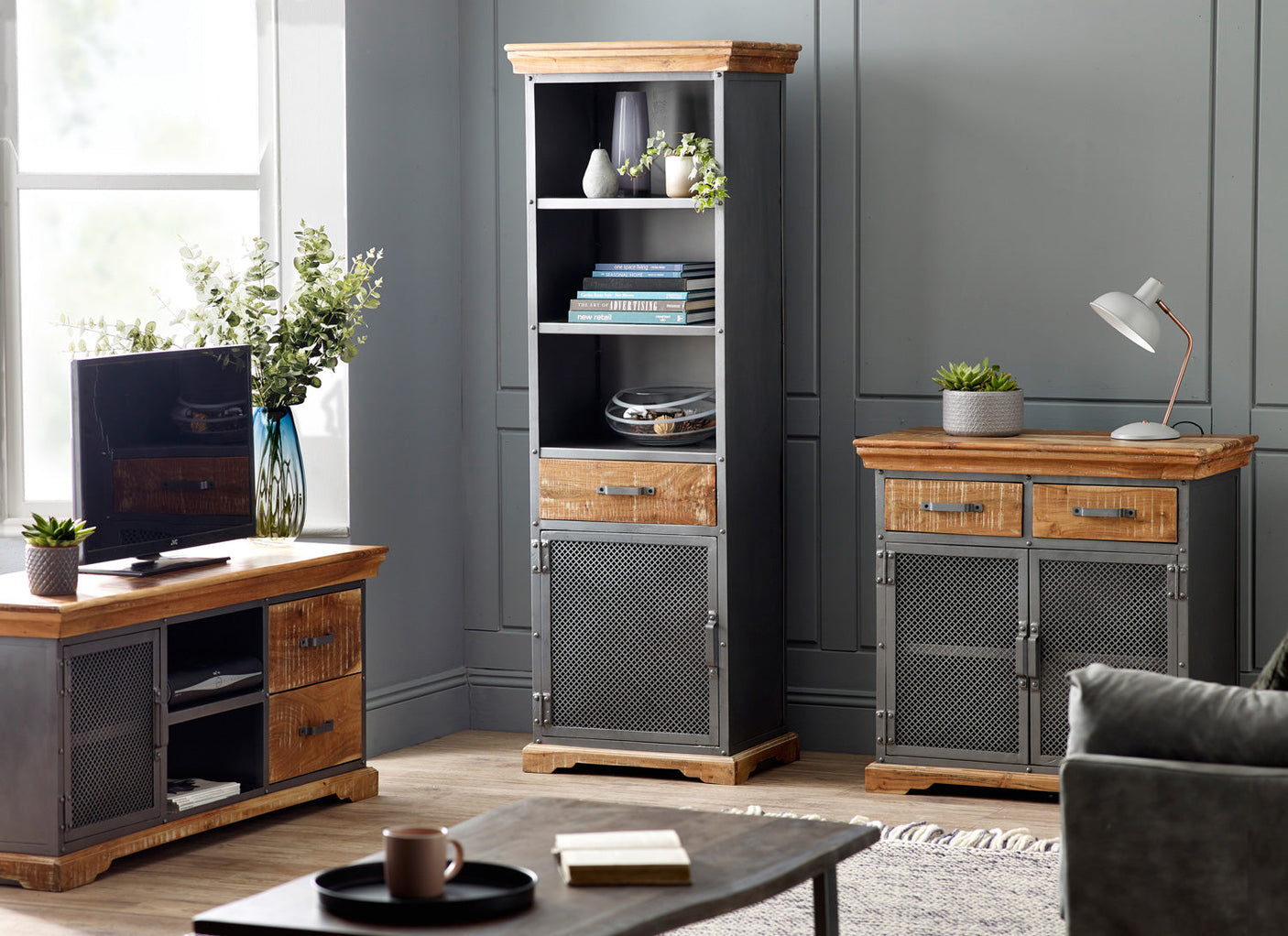 Metropolis Industrial TV media unit made of acacia wood with open shelves and drawers