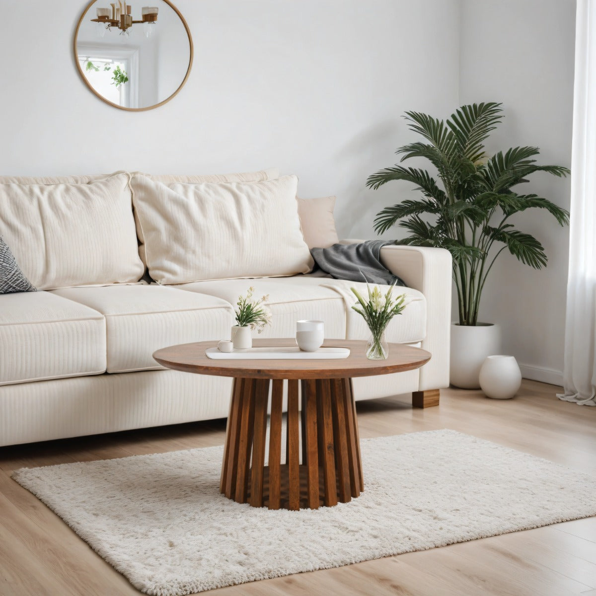 Round slatted coffee table made from sustainably sourced mango wood