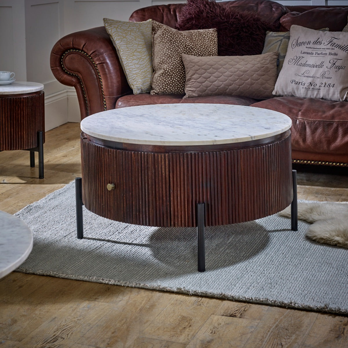 Opal round coffee table with marble top and fluted mango wood surround