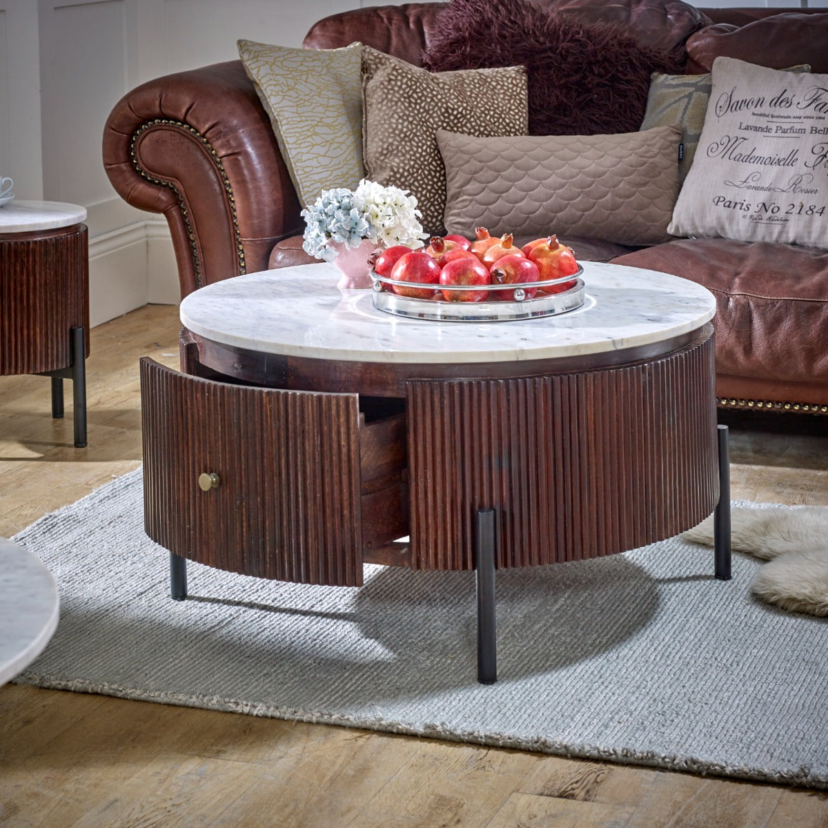 Opal round coffee table with marble top and fluted mango wood surround