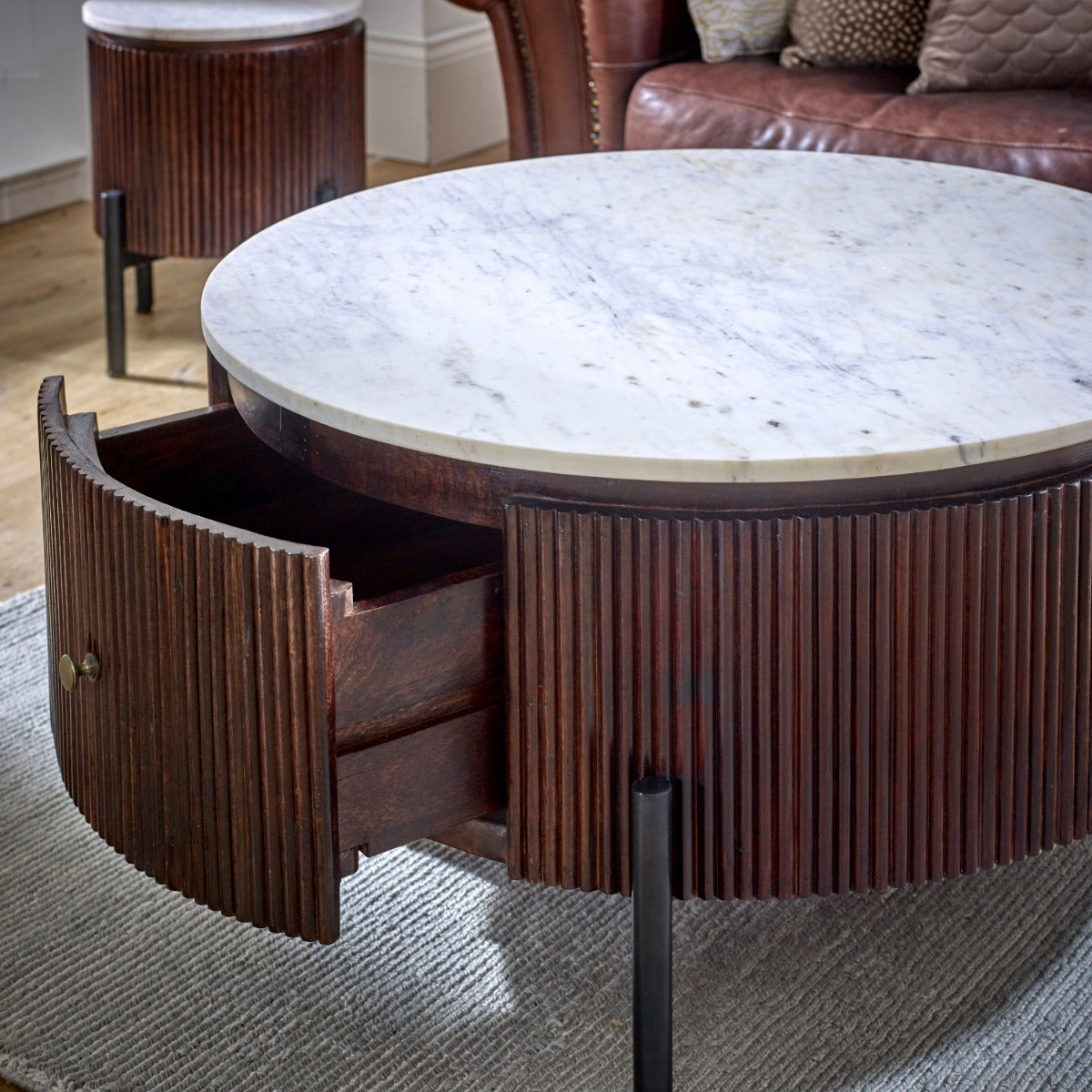 Opal round coffee table with marble top and fluted mango wood surround