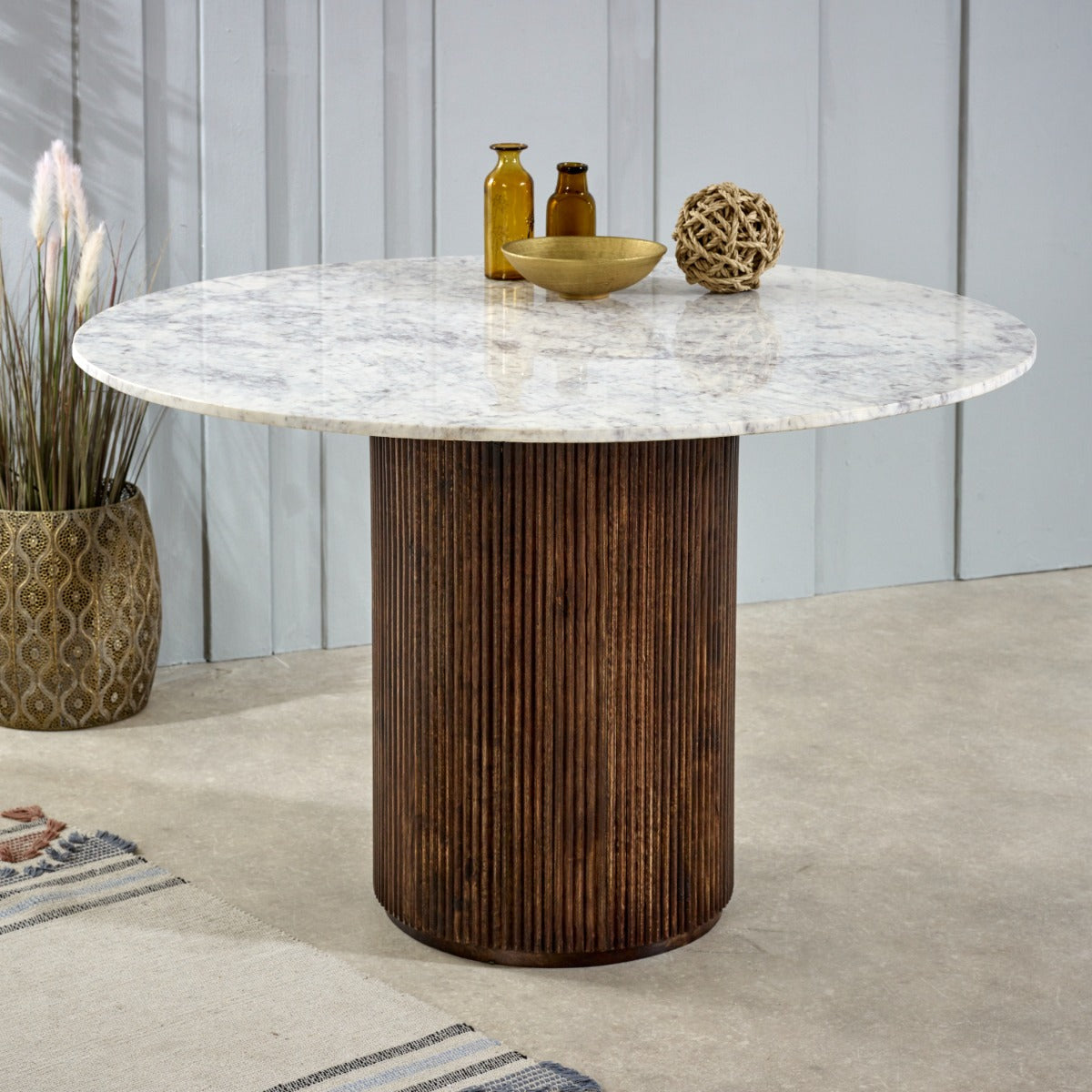 Round Opal dining table with mango wood pedestal and marble top