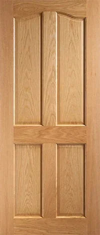 Oak interior door with four raised panels and natural wood grain finish