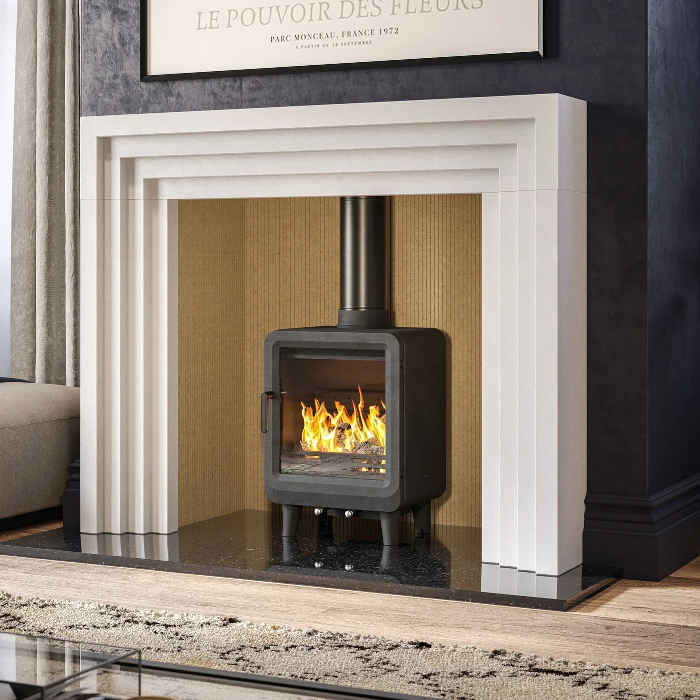 Obsidian slim stove with glass door set in modern white fireplace surround, fire burning