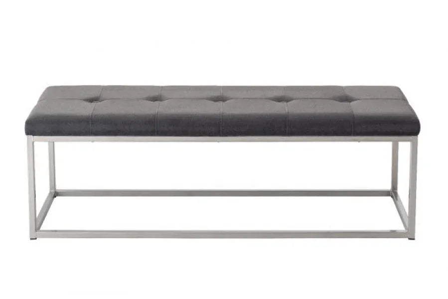Grey upholstered bench with chrome metal frame and tufted cushion, front view