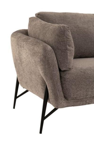 Corner view of grey fabric sofa with black metal legs and plush seat cushion
