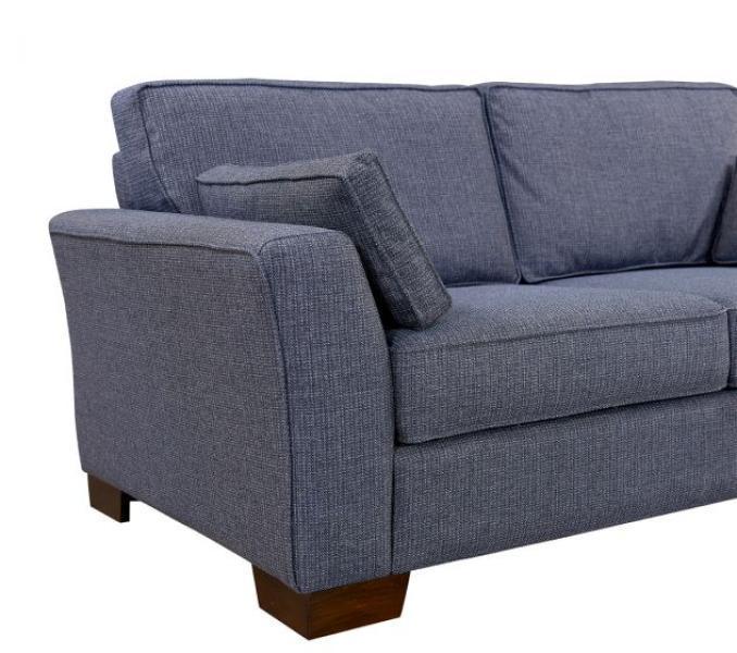 Blue fabric sofa with wooden legs and matching scatter cushion, left side view