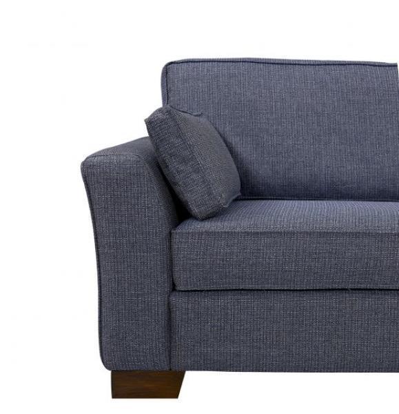 Blue fabric sofa arm with cushion and wood leg corner view