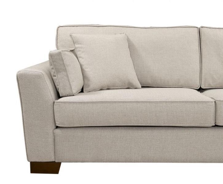 Beige fabric sofa with scatter cushions and wooden feet, left-side angle view