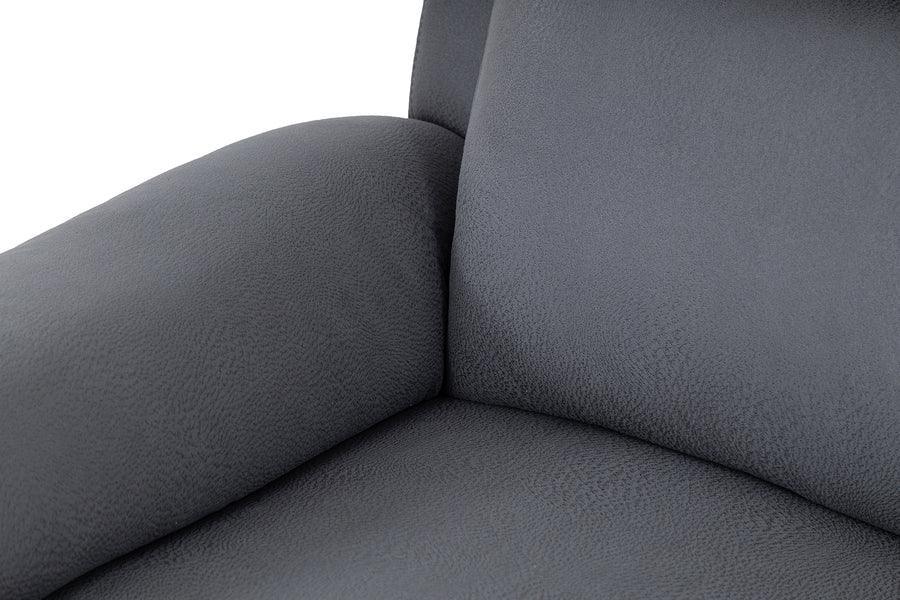 Dark grey fabric sofa arm and seat close-up showing textured upholstery