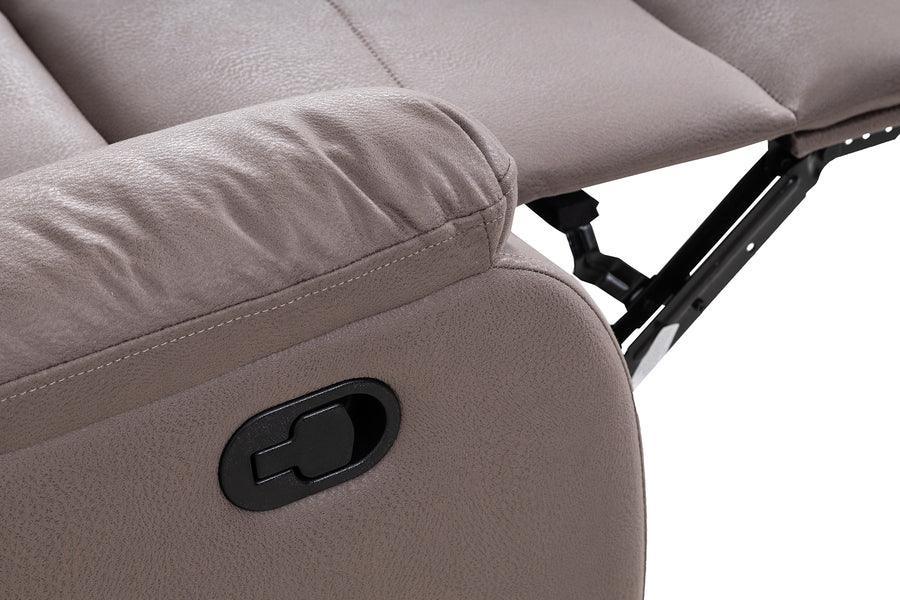 Closeup of beige recliner sofa armrest with lever and extended footrest