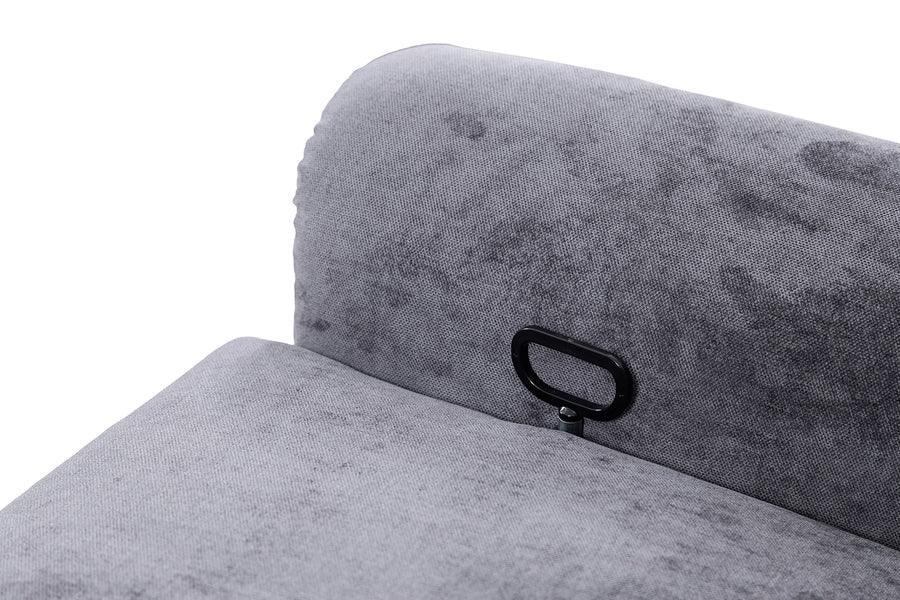 Closeup of grey fabric recliner sofa backrest with visible recline handle