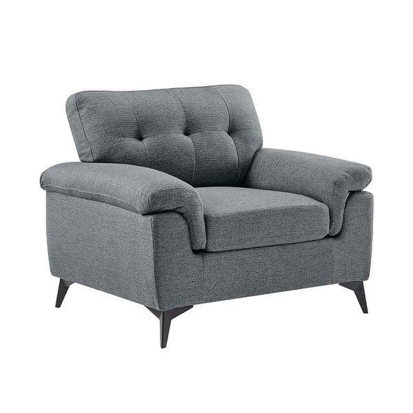 Grey fabric armchair with tufted backrest and angled wooden legs