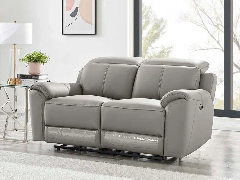 Grey leather recliner sofa for two with padded arms in modern living room