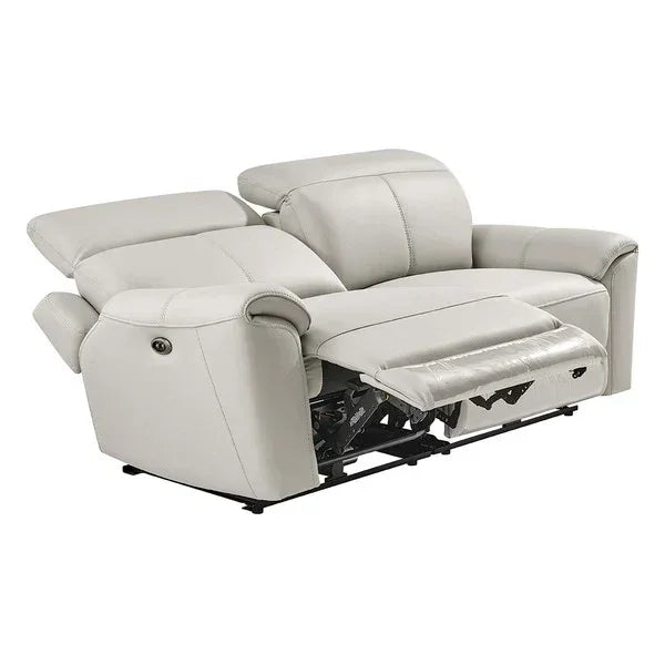 Light grey leather reclining sofa with adjustable headrests and extended footrest