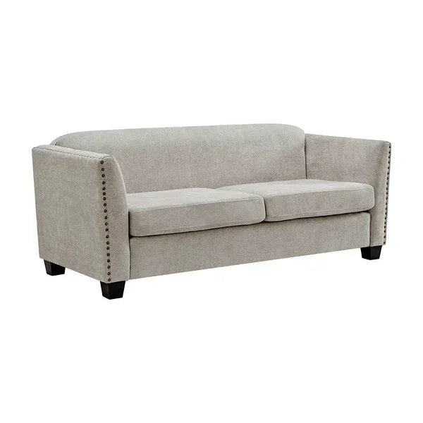 Light grey fabric sofa with nailhead trim and two seat cushions, front angle view