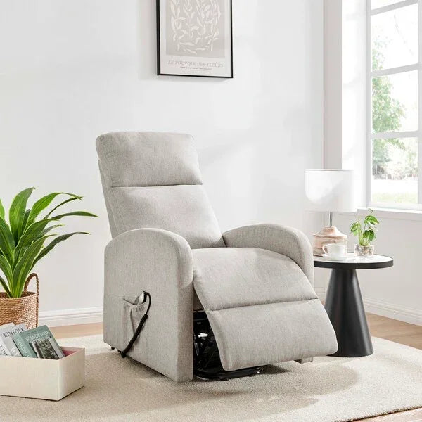 Light grey fabric recliner chair with footrest in modern living room setting