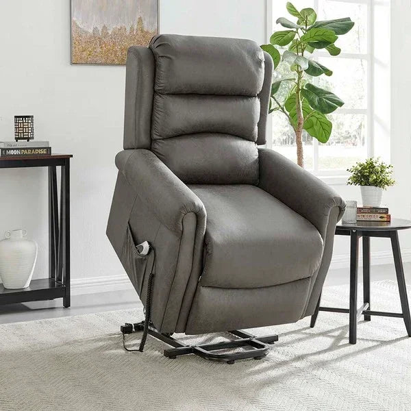 Grey fabric recliner chair with lift function in modern living room setting