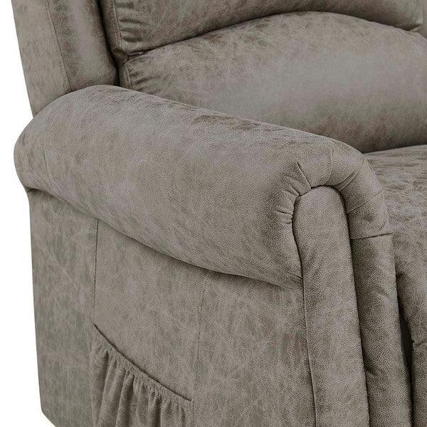 Close-up of grey fabric armchair with ruched armrest and padded cushion detail